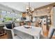 Eat-in kitchen and dining area shows table, chairs, wood ceiling, and kitchen appliances at 14344 83Rd Pl, Seminole, FL 33776