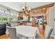 Eat-in kitchen and dining area shows table, chairs, wood ceiling, and kitchen appliances at 14344 83Rd Pl, Seminole, FL 33776
