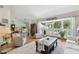 Bright, open living room with large bay window at 14344 83Rd Pl, Seminole, FL 33776