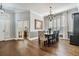 Formal dining room with hardwood floors and french doors at 14609 Canopy Dr, Tampa, FL 33626