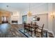 Elegant dining room with hardwood floors and a beautiful chandelier at 1522 Riverdale Dr, Oldsmar, FL 34677