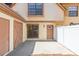 Exterior showing the front door and a fenced in private patio area at 16075 Dawnview Dr, Tampa, FL 33624