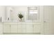 Modern bathroom with double vanity, ample storage, and a bright, clean design at 18140 Serene Lake Loop, Lutz, FL 33548