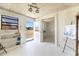 Bright and airy entryway with natural light, white walls, and unique decor at 24549 Nova Ln, Punta Gorda, FL 33980