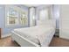 Well-lit bedroom with a large window, white furniture, and a cozy, inviting feel at 2610 58Th S St, Gulfport, FL 33707