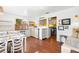 Charming dining area with views to a kitchenette and stylish decor at 2610 58Th S St, Gulfport, FL 33707