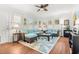 Bright living room with modern furniture, hardwood floors, and ample natural light at 2610 58Th S St, Gulfport, FL 33707
