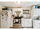 Contemporary kitchen with stainless steel appliances, sleek countertops, and ample storage at 2708 N Mitchell Ave, Tampa, FL 33602