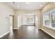 Inviting living room with hardwood floors, neutral paint and plenty of natural light at 2708 N Mitchell Ave, Tampa, FL 33602