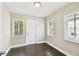 Bonus room with natural light, hardwood floors, and outdoor access at 2708 N Mitchell Ave, Tampa, FL 33602