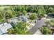 Spacious property featuring a pool, pond, and a well-maintained home in a lush neighborhood at 2779 Diane Ter, Clearwater, FL 33759