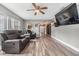 Spacious living area with hardwood floors, comfortable seating, and plenty of natural light at 2779 Diane Ter, Clearwater, FL 33759