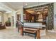 Beautiful open kitchen with a breakfast bar, wooden cabinetry, and coffered ceilings at 3 Paradise Ln, Treasure Island, FL 33706