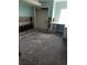 A view of a kitchen during renovation with missing cabinets and plaster at 3 Paradise Ln, Treasure Island, FL 33706