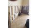Room under renovation with tile floor and exposed wall studs at 3 Paradise Ln, Treasure Island, FL 33706