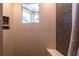 Walk-in shower features beautiful tile and glass accents at 3 Paradise Ln, Treasure Island, FL 33706