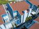 Well maintained condos with rooftop decks and manicured landscaping at 343 Rex Pl # G, Madeira Beach, FL 33708