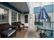 Relaxing outdoor patio area with comfortable seating and table at 343 Rex Pl # G, Madeira Beach, FL 33708