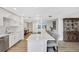 Bright modern kitchen features stainless appliances, quartz counters and breakfast bar with seating at 400 Island Way # 201, Clearwater Beach, FL 33767
