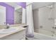 Charming bathroom showcasing a sink with a single faucet, vanity, toilet, and shower with tub at 4027 Davit Dr, New Port Richey, FL 34652