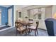 Cozy dining room with plush carpeting and views of the community at 4027 Davit Dr, New Port Richey, FL 34652