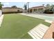 Community lawn and shuffleboard court, adjacent to the pool, for outdoor recreation and leisure at 4027 Davit Dr, New Port Richey, FL 34652