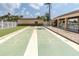Shuffleboard court with shade, for outdoor recreation and relaxation at this community at 4027 Davit Dr, New Port Richey, FL 34652
