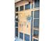 Organized storage area with pegboard, shelves, and hooks for tools and other items at 4027 Davit Dr, New Port Richey, FL 34652