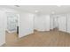 Spacious bathroom with glass shower, neutral tones and hardwood floors at 445 33Rd N Ave, St Petersburg, FL 33704