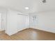 Clean bedroom with wood floors, white walls and a double door closet at 445 33Rd N Ave, St Petersburg, FL 33704