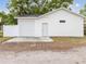 Detached garage with door plus extra side door for easy access and convenience at 445 33Rd N Ave, St Petersburg, FL 33704