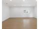 Large, airy living room with wood floors, recessed lighting, and lots of natural light at 445 33Rd N Ave, St Petersburg, FL 33704