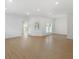 Large, airy living room with wood floors, recessed lighting, and views to outdoors at 445 33Rd N Ave, St Petersburg, FL 33704