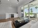 Living room has balcony access and includes a built-in wine cooler and bar area at 4515 W North A St # 8, Tampa, FL 33609