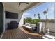 Outdoor deck featuring a couch, grill, ceiling fan, and beautiful views at 4515 W North A St # 8, Tampa, FL 33609