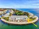 Stunning aerial view of waterfront condos offering panoramic views of the ocean and marina at 5285 Coquina Key Se Dr # C, St Petersburg, FL 33705