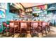 Charming bar area with stools, nautical decor, and plenty of space for entertaining at 5285 Coquina Key Se Dr # C, St Petersburg, FL 33705
