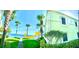 Corner unit with private side balcony, lush landscaping and nearby walking path to the water at 5285 Coquina Key Se Dr # C, St Petersburg, FL 33705