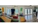 Open-concept living room with fireplace and sweeping water views at 5285 Coquina Key Se Dr # C, St Petersburg, FL 33705