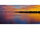 Picturesque waterfront view with stunning sunset colors reflecting on the calm waters at 5285 Coquina Key Se Dr # C, St Petersburg, FL 33705