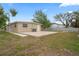 Spacious backyard with a concrete patio, perfect for outdoor entertaining and relaxation at 5300 6Th S Ave, St Petersburg, FL 33707