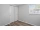 Bedroom with new flooring and closet at 5300 6Th S Ave, St Petersburg, FL 33707