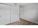 Bedroom with large closet and new flooring at 5300 6Th S Ave, St Petersburg, FL 33707