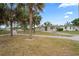 This home has a well maintained lawn and is framed by mature palm trees, great location at 5300 6Th S Ave, St Petersburg, FL 33707