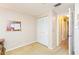 Bedroom featuring double closet, neutral carpet and walls at 5419 Marlwood Ct, Tampa, FL 33624