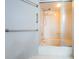 Clean bathroom with a shower-tub combo and grab bars at 6073 Bahia Del Mar Blvd # 129, St Petersburg, FL 33715