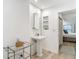 Modern bathroom with pedestal sink and doorway leading to bedroom at 700 S Harbour Island Blvd # 143, Tampa, FL 33602