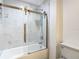 Stylish bathroom featuring a glass-enclosed tub with rain shower head for a luxurious bathing experience at 700 S Harbour Island Blvd # 143, Tampa, FL 33602