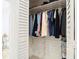 Open closet with hanging clothes and shelving at 700 S Harbour Island Blvd # 143, Tampa, FL 33602