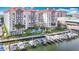 Waterfront condo building featuring a pool and marina at 700 S Harbour Island Blvd # 143, Tampa, FL 33602